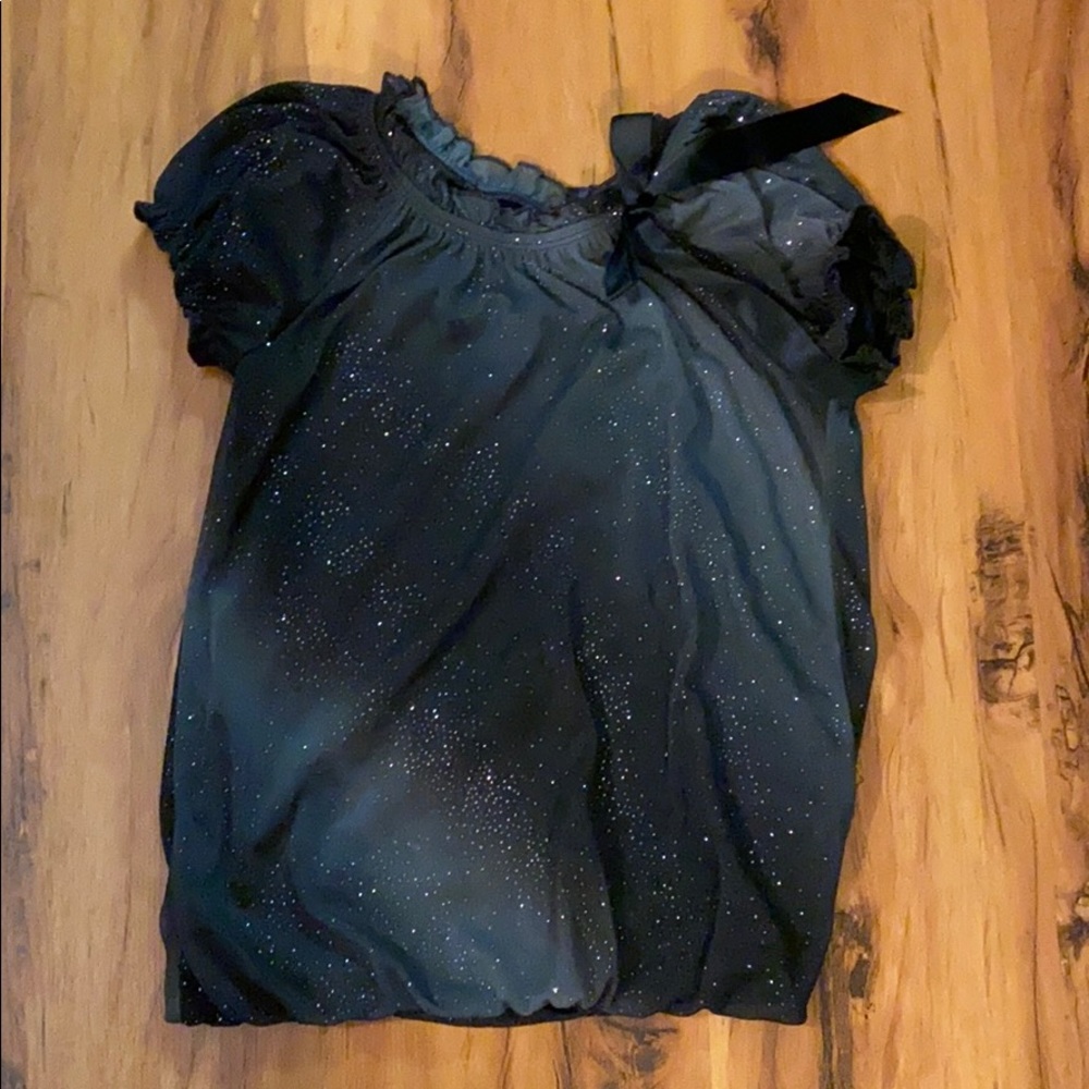 Black shimmer blouse with little ruffleles
